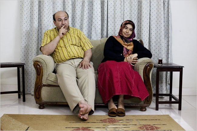 Mesut Kacmaz, principal of a PakTurk school in a poor neighborhood of Karachi, and his wife, Meral, in their home. Credit Carolyn Drake for The New York Times