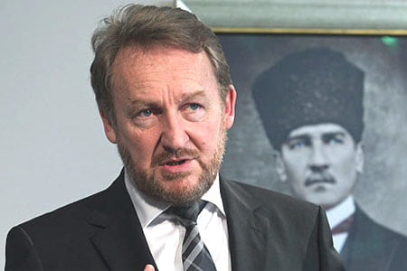 Bakir Izetbegovic speaks to the media during a joint news conference with Turkey's Foreign Minister Ahmet Davutoğlu, unseen, in Turkish capital of Ankara on Feb. 15, 2012. (Photo: AP)