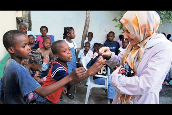 Volunteers from Kimse Yok Mu presented gifts to around 100 Haitian orphans