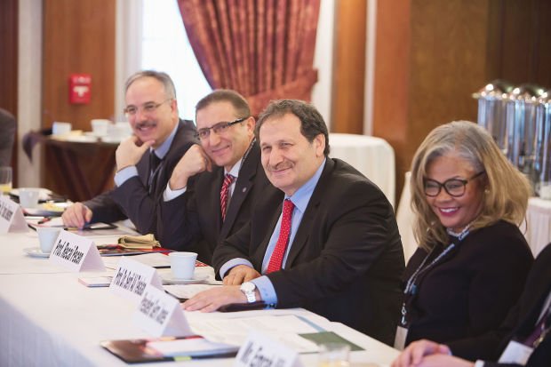 Dr. Yunus Bekdemir, Professor Recai Pecen, Dr. Serif Ali Tekalan and Interim President Geraldine Jones share a laugh during a panel discussion.