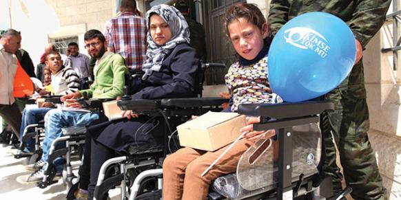Turkish Relief Organization Kimse Yok Mu presented battery-powered cars to physically handicapped Palestinians.